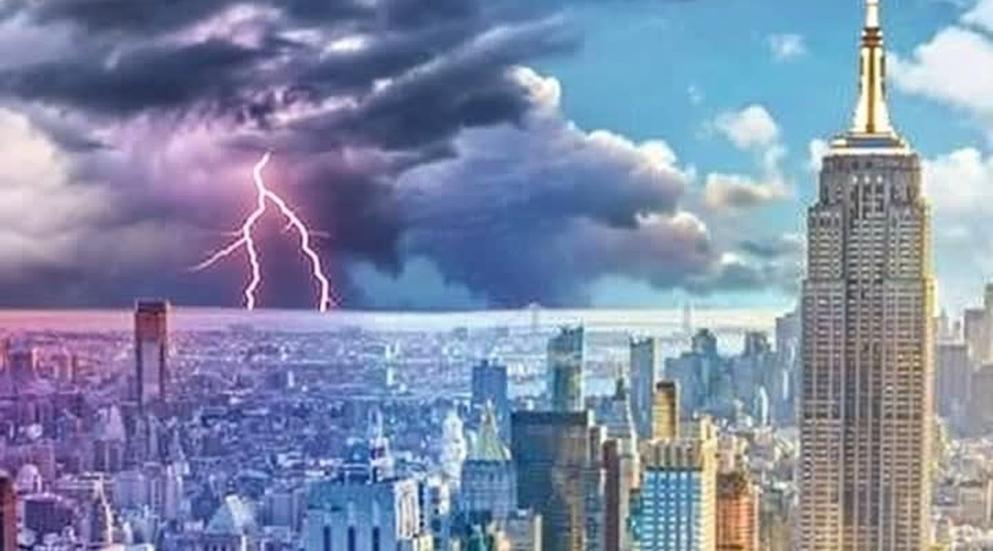 New York City split between a winter storm and a summer afternoon, seen from a rooftop over midtown toward the Empire State Building
